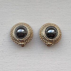 Goldtone Metal with Pearlescent Black Center Clip-On Earrings